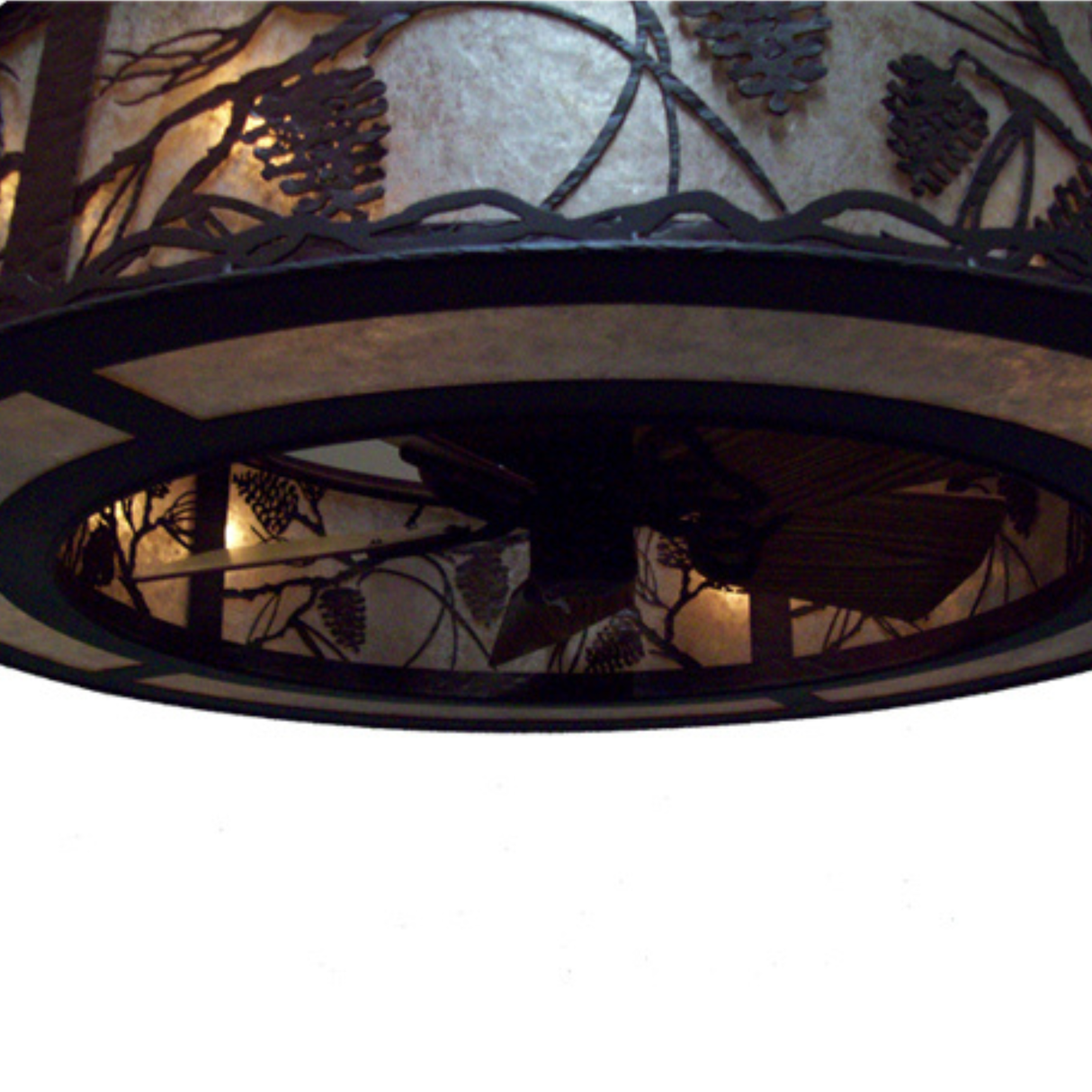 Bottom view showing integrated fan and pine motif diffuser.