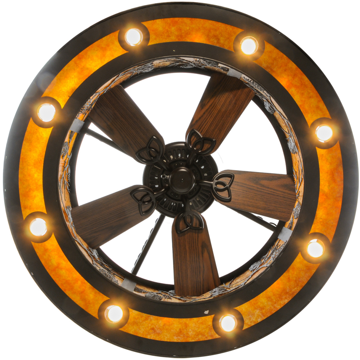 Bottom lit view showing downlights and fan blades framed in amber glow.