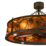 Closeup lit angle highlighting handcrafted pinecone cutouts.