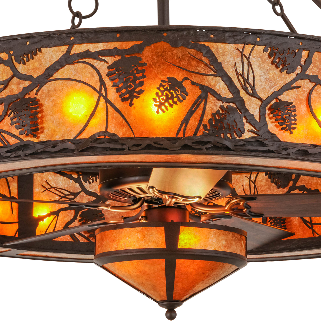 Closeup showing pine motif cutouts and detailed amber mica diffuser.