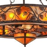 Closeup showing pine motif cutouts and detailed amber mica diffuser.