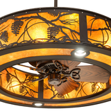 Close-up highlighting fan motor and pine branch detail on amber mica panels.