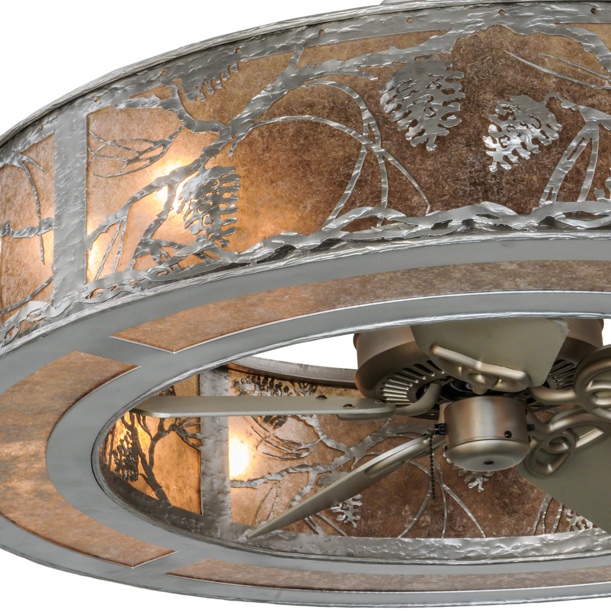 Closeup lit detail highlighting pinecone motifs and glowing mica.