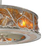 Closeup showing illuminated pinecone design and hammered metal edge.
