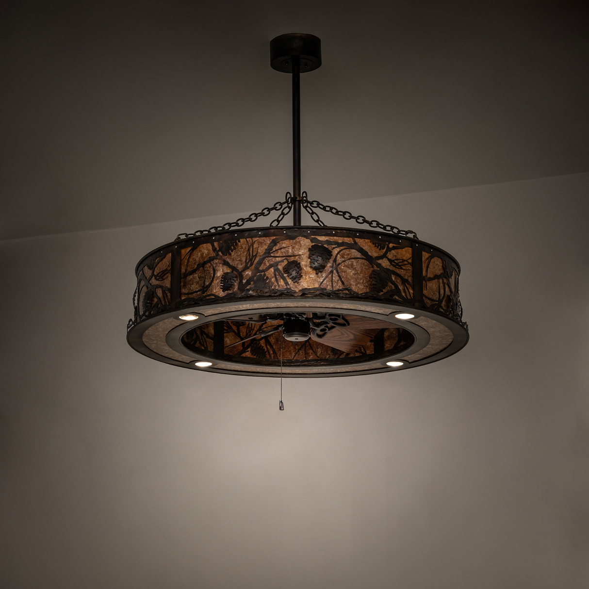 Whispering Pines Chandel-Air dark room unlit view showing pinecone details and copper frame.