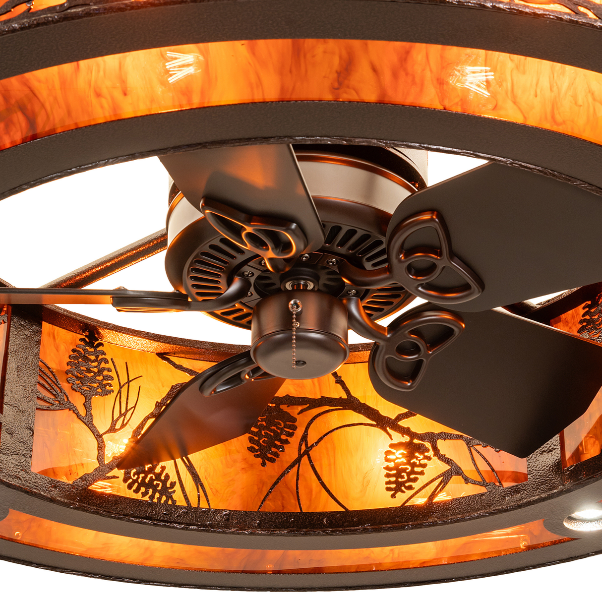 Detailed view of fan and light assembly inside Whispering Pines chandelier.