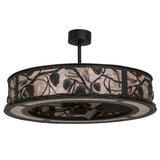 Front unlit view showing handcrafted pinecone design and textured black finish.
