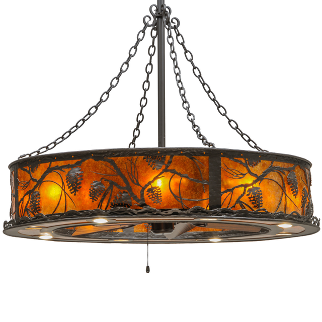Front lit view with glowing amber mica panels and pine branch cutouts.