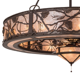 Closeup showing pinecone design and bronze finish details.