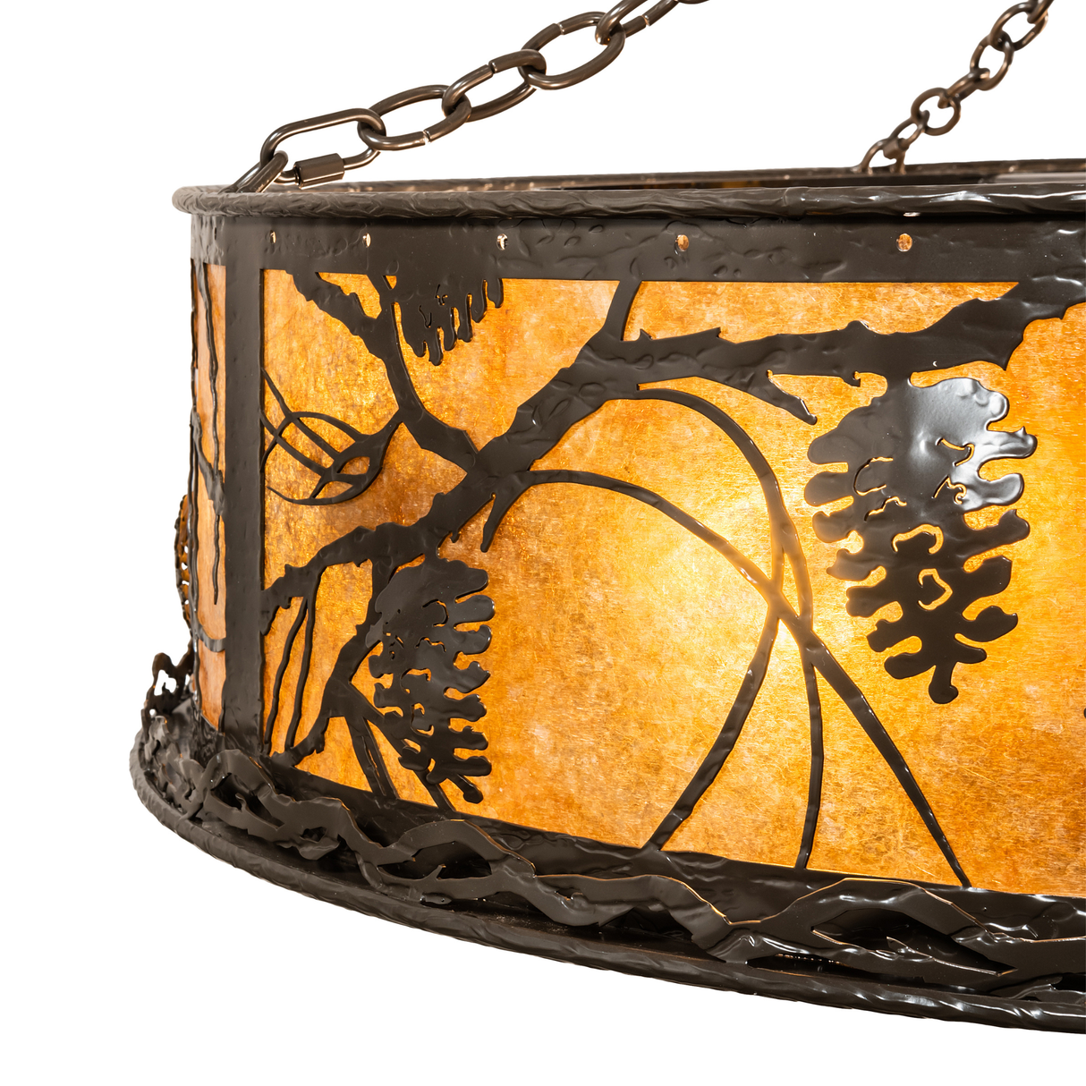 Close-up of fan beneath softly glowing mica and metalwork.