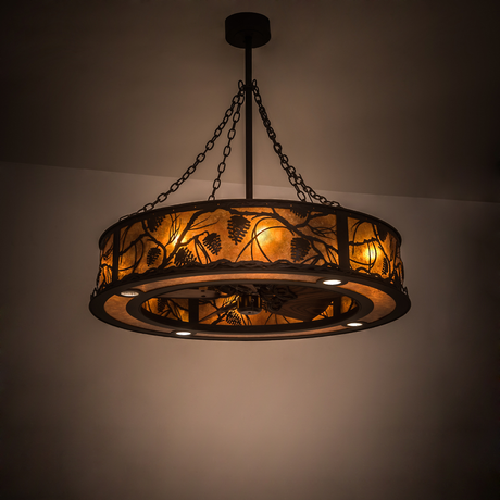Whispering Pines Chandel-Air illuminated in warm ambient light within a rustic space.