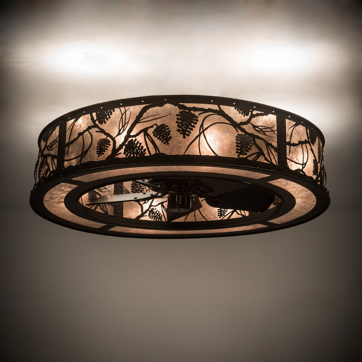 Whispering Pines Chandel-Air softly illuminating a room ceiling.