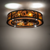 Whispering Pines Chandel-Air illuminating rustic room with warm amber glow.