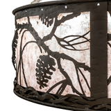Detailed view of bronze pinecone cutouts on mica diffuser.
