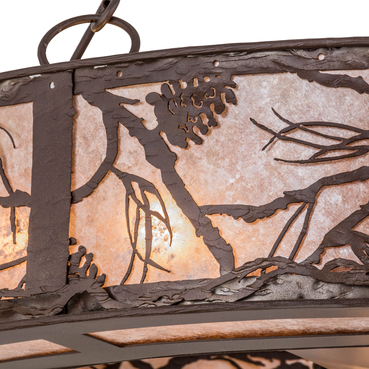 Detailed view of silver mica shade with pine pattern.