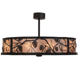Side lit view highlighting warm mica glow and metal pinecone pattern.