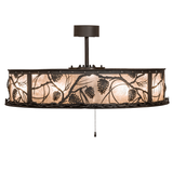 Side lit angle showing glowing mica diffuser and detailed pine motif.