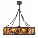 Side view of Whispering Pines Chandel-Air featuring pinecone and branch metalwork.