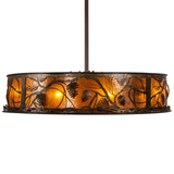 Side lit view highlighting layered pinecone silhouettes on amber mica.