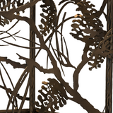 Detailed frame showing pinecones and branches on pot rack.