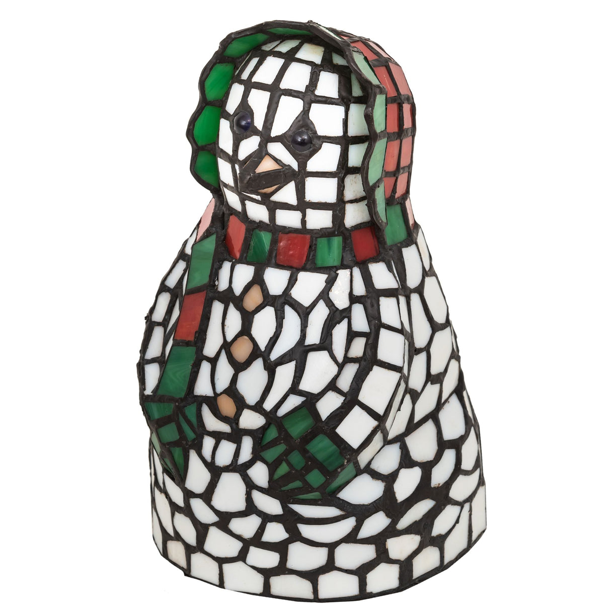 Side view of a white snow woman accent lamp with green and red details.