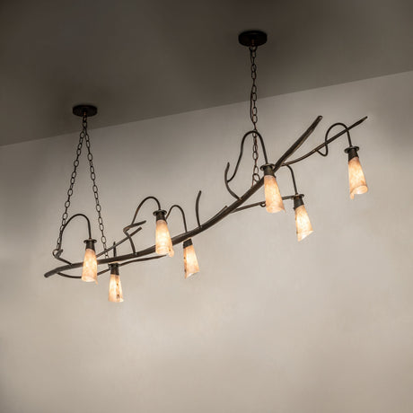 Winter Solstice oblong chandelier shown in ambient setting with warm illuminated mica shades.