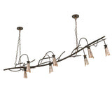 Unlit view of chandelier highlighting branch-inspired metal design and mica shades.