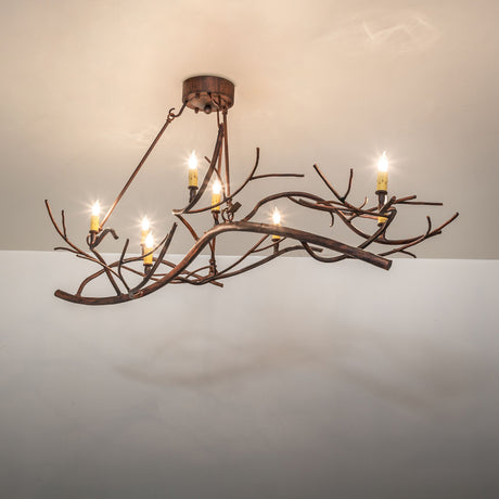 Nature-inspired branch chandelier creating warm ambient lighting in a room.