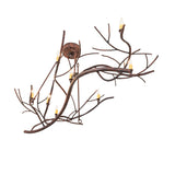 Angled bottom view revealing intertwined branches and candlelight spacing.