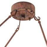 Close-up of driftwood brown ceiling canopy and metal suspension rods.