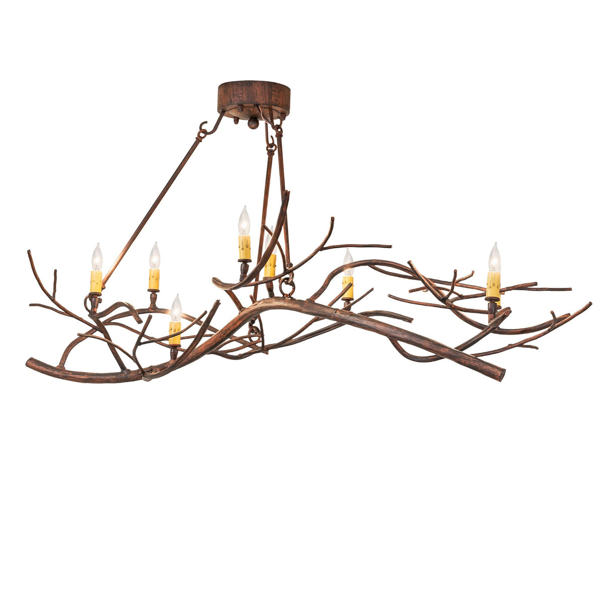 Lit view of oblong chandelier featuring pine branch metal arms and glowing ivory candlelights.