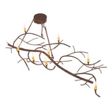 Top angle view highlighting the flowing branch layout and candle placements.