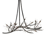 Winter solstice budding chandelier unlit, showing dark burnished metal branches and organic form.