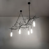 Ambient room view of the Winter Solstice chandelier softly lighting the space.