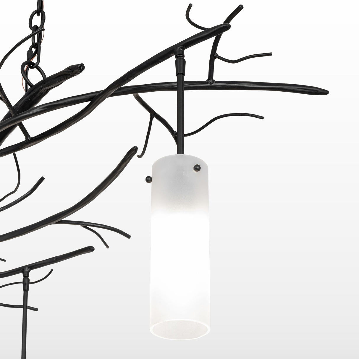 Closeup detail of the frosted cylindrical glass pendant on the Winter Solstice fixture.