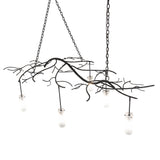 Top angle view focusing on the chandelier’s organic bramble-style frame.