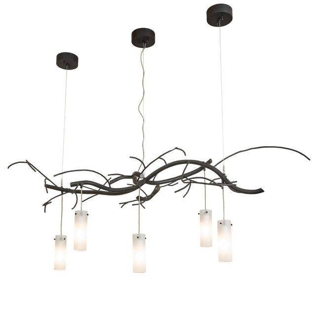 Lit view, glowing frosted glass cylinders suspended from branch-style metalwork.