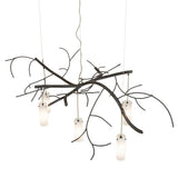 Top angle view revealing suspension cables, canopy placement, and the natural branch-inspired structure.