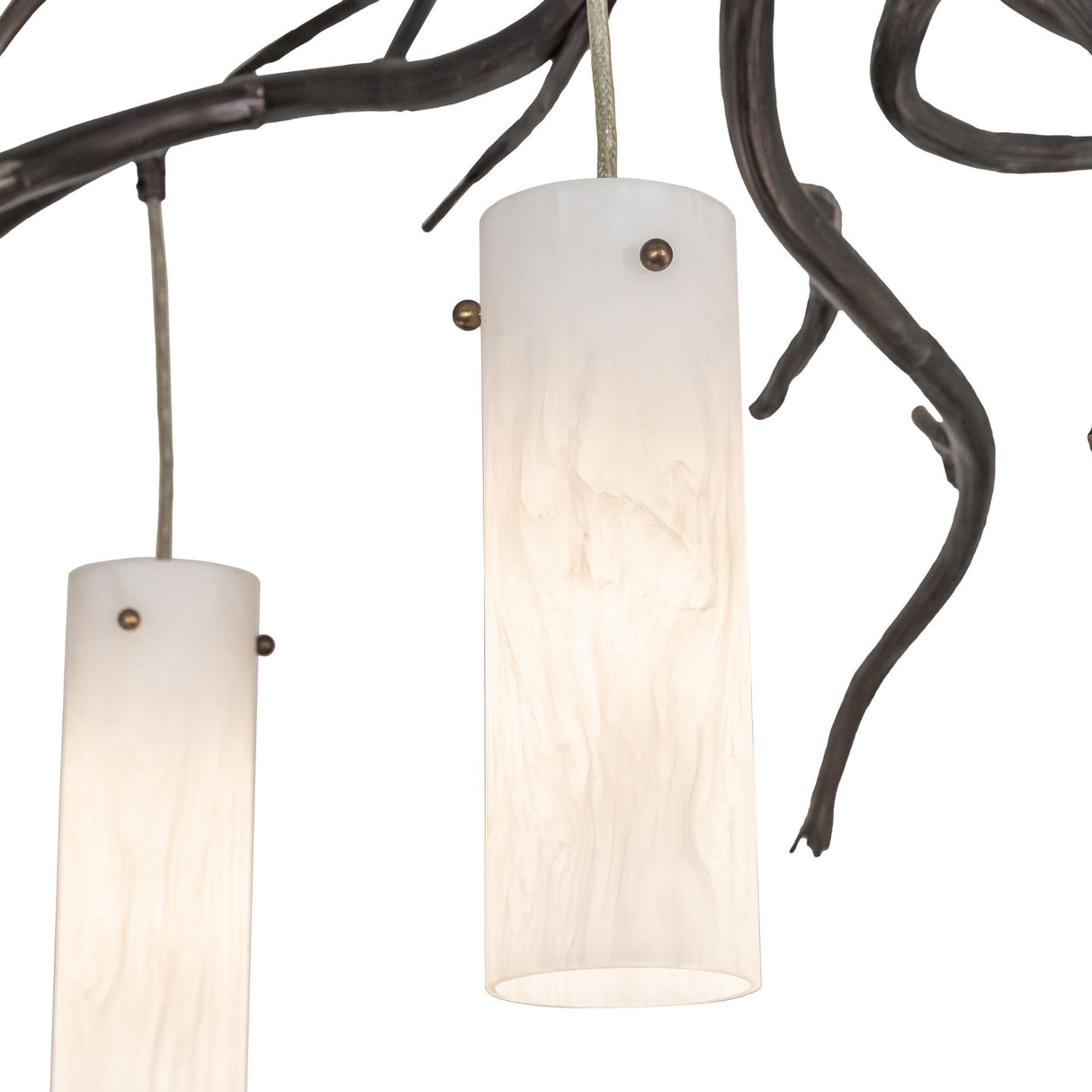 Close-up detail of a cylindrical glass shade suspended from branch-style metal arms on the chandelier.