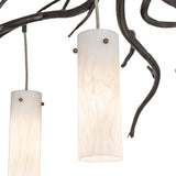 Close-up detail of a cylindrical glass shade suspended from branch-style metal arms on the chandelier.